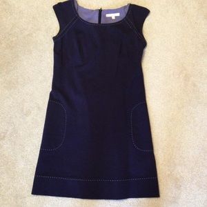 Slim fitting sleeveless dress.
